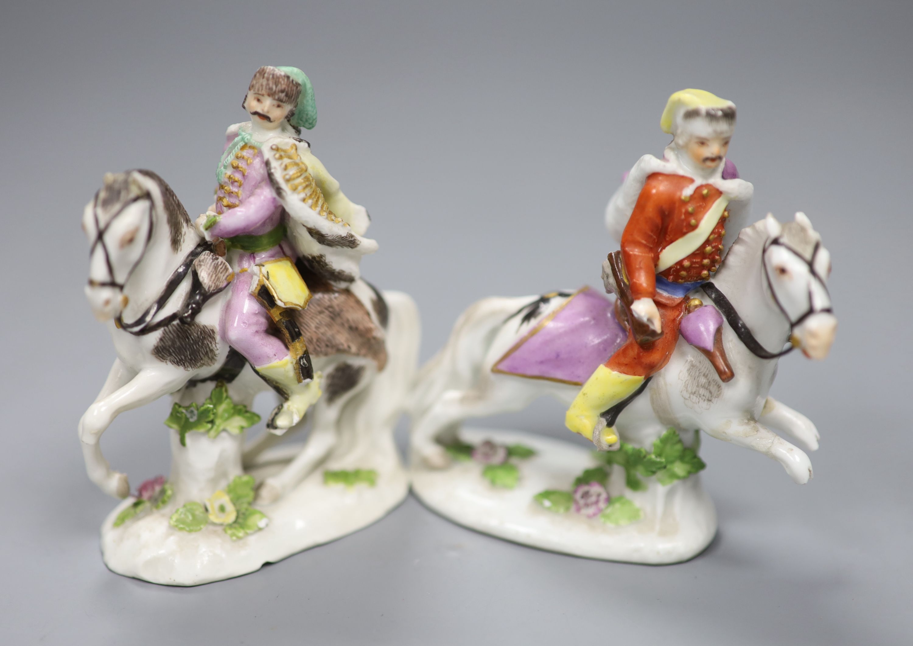 A pair of Meissen equestrian hunting figures, mid 18th century, 9cm